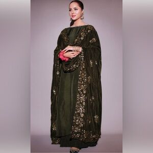 Olive green shalwar kameez.